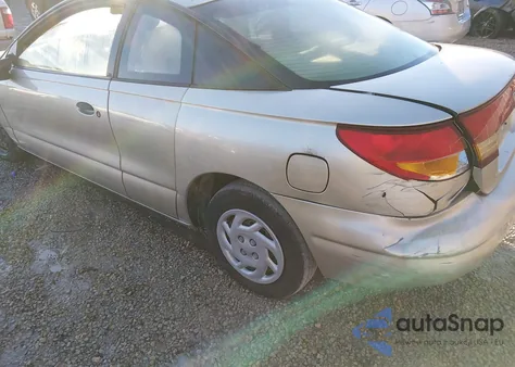 1999 Saturn Sc1 z USA, uszkodzony, nr VIN 1G8ZP1289XZ366065